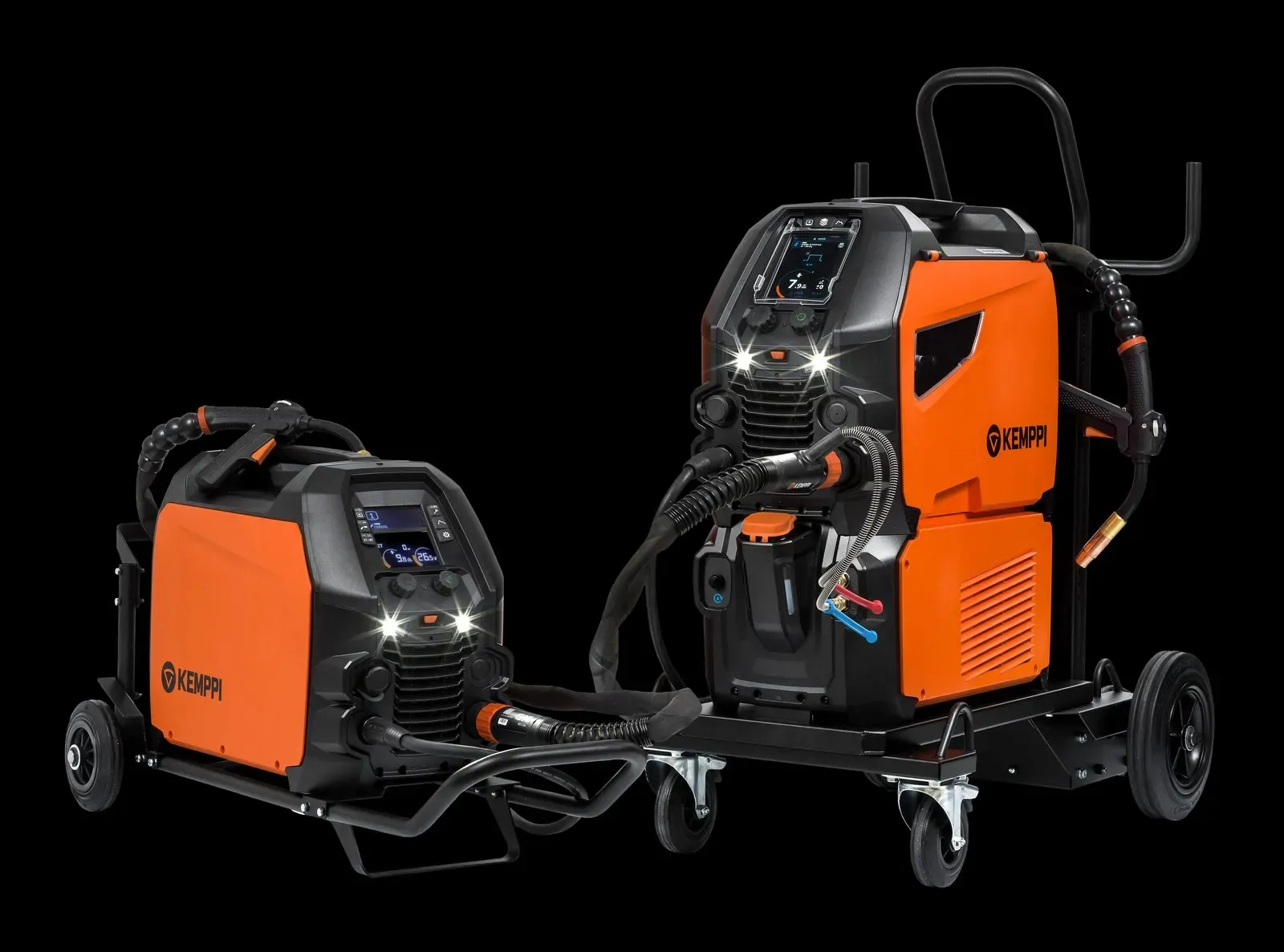 Two Master M welders on trolleys, with work lights on